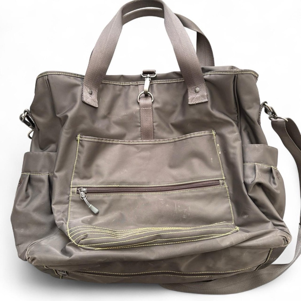 Athleta gym tote bag with multiple pockets and zippers